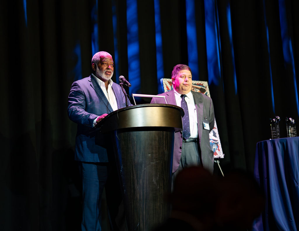 Man speaking at podium